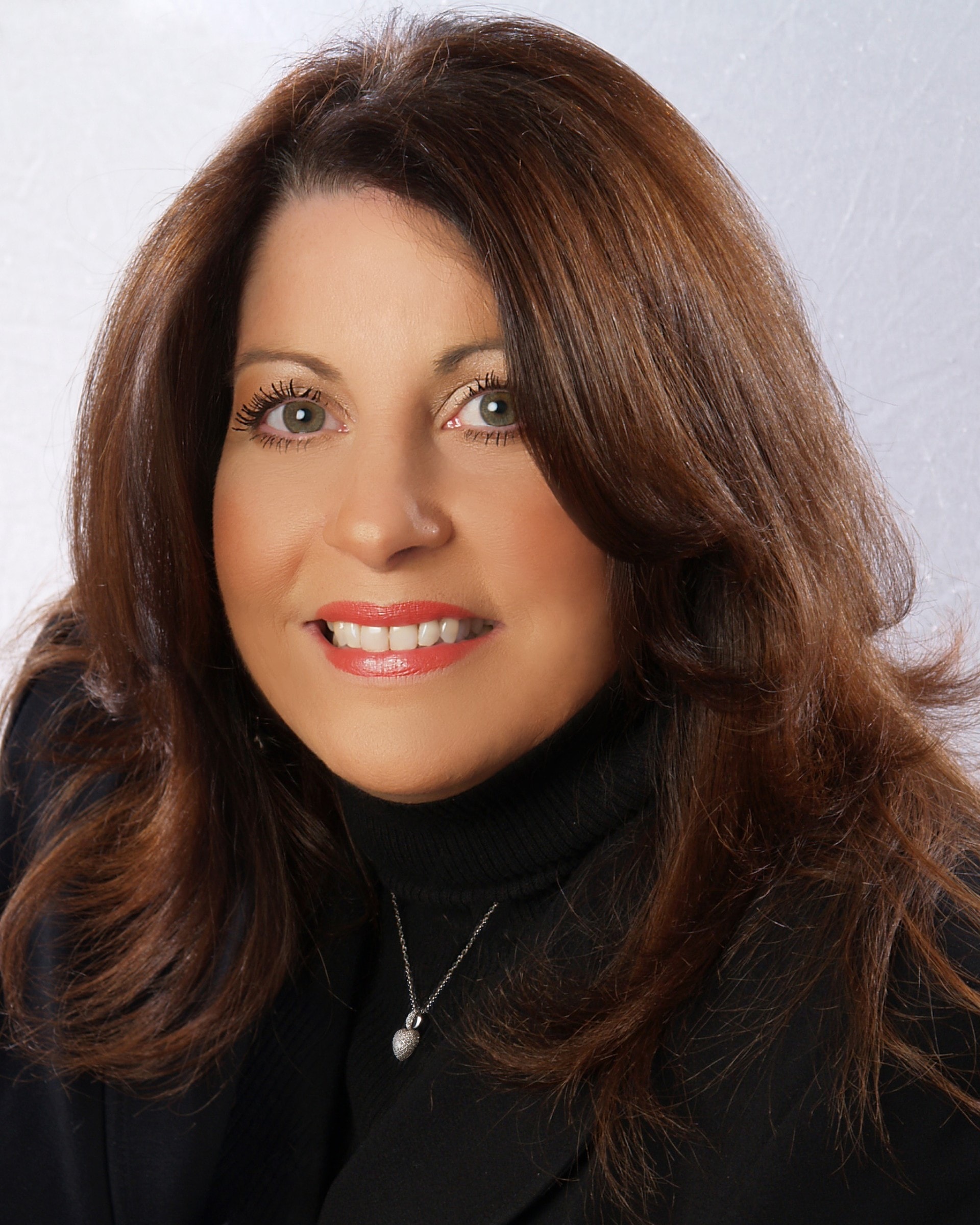 Teresa A. Angelino, President and CEO